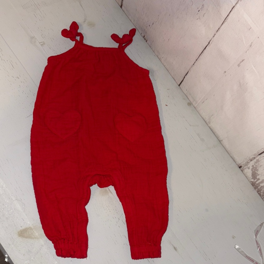 Red Jumpsuit with Heart Pockets